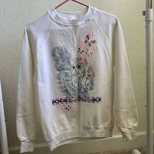 White sweater with cat  rhinestone eyes